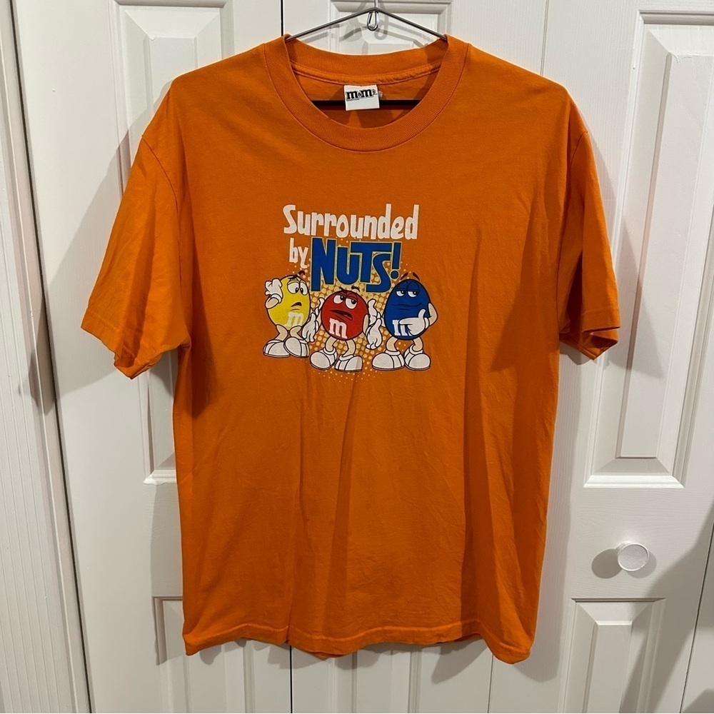 Y2K M&M’s Surrounded by Nuts Orange Shirt